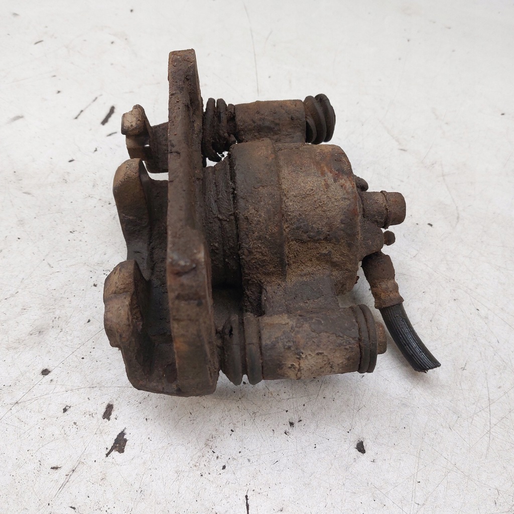 фото №10, Suzuki jimny суппорт тормозной левый перед