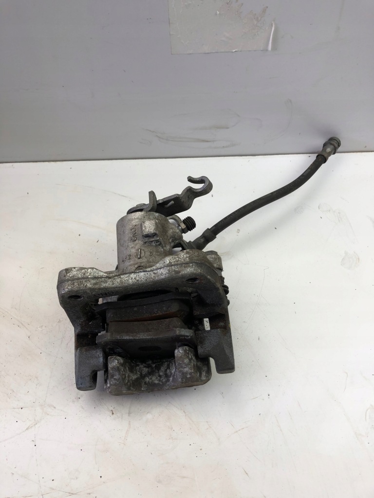 фото №1, Vw golf touran суппорт тормозной правый задняя trw