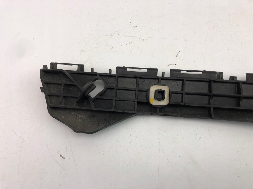 фото №12, Toyota yaris iii кронштейн направляющая бампера правый задняя 52575-0d270