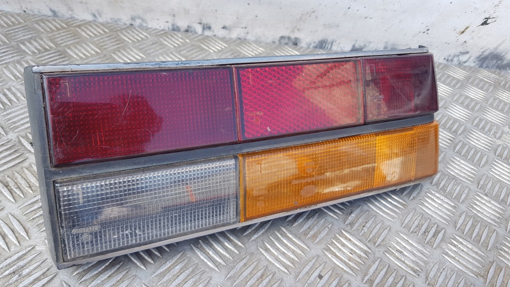 Купить Audi 100 c2 лампа левая задний  вкладыш