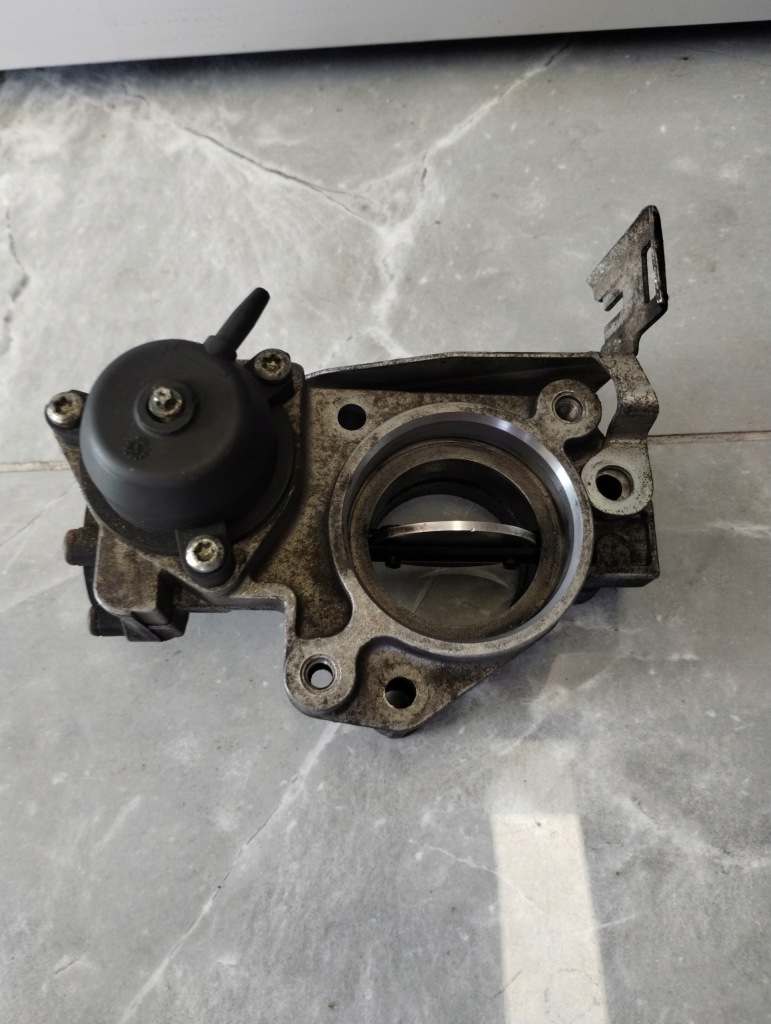 фото №1, Дросельна заслінка opel 55195014