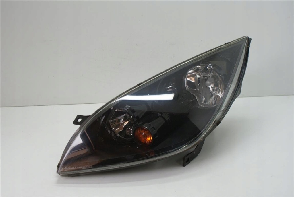 фото №1, Mitsubishi colt 04-07r левая лампа перед тонированная eur