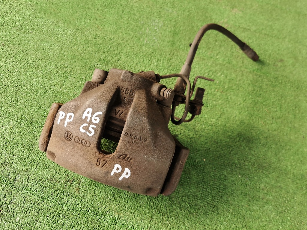 фото №1, Audi a6 c5 суппорт тормозной + тормозные колодки правый перед