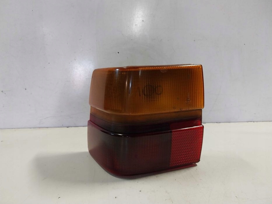 Купити Фара лівий задній audi 100 седан