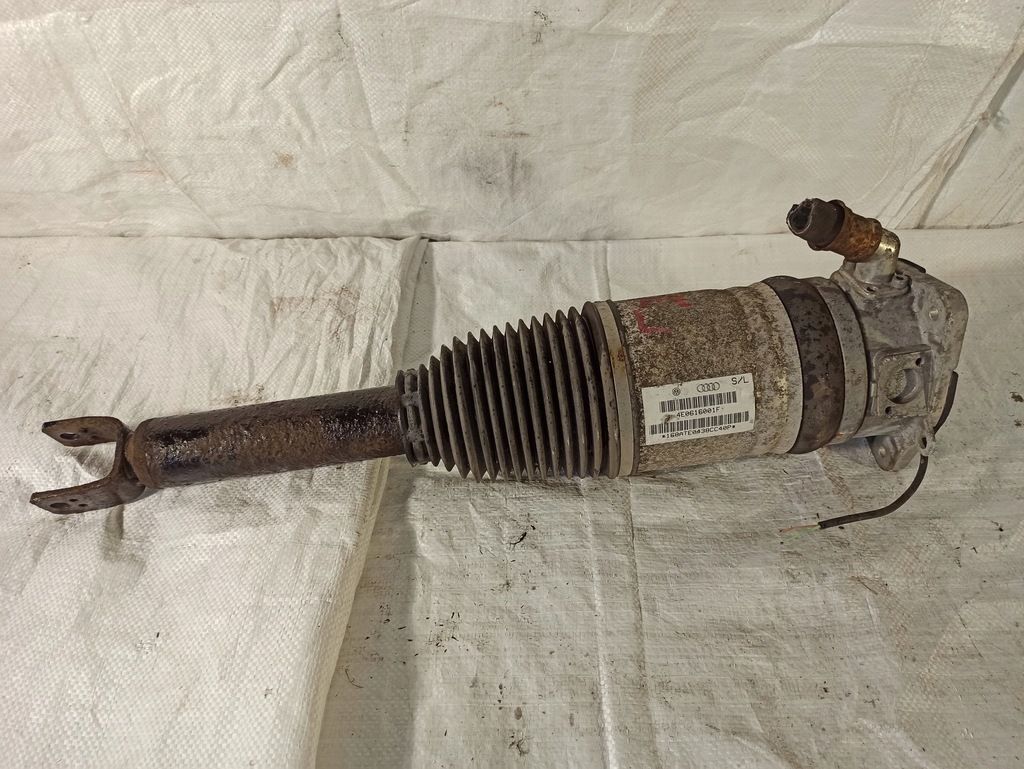 фото №1, Audi a8 d3 амортизатор пневмоподушка левый задняя 4e0616001f