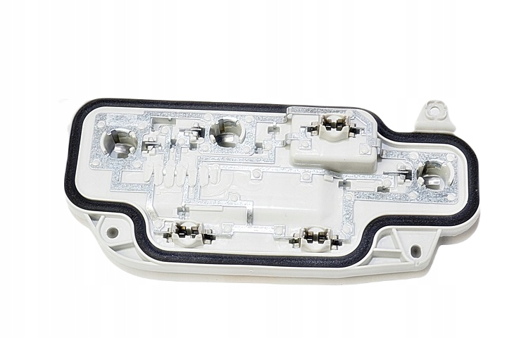 фото №1, Вкладыш цоколь левая лампы задняя caddy vw оригинал оригинальный номер