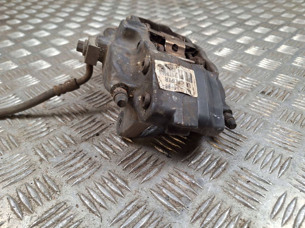 Суппорт тормозной задний задний  сторона левая tesla model s 600643400c с Разборки