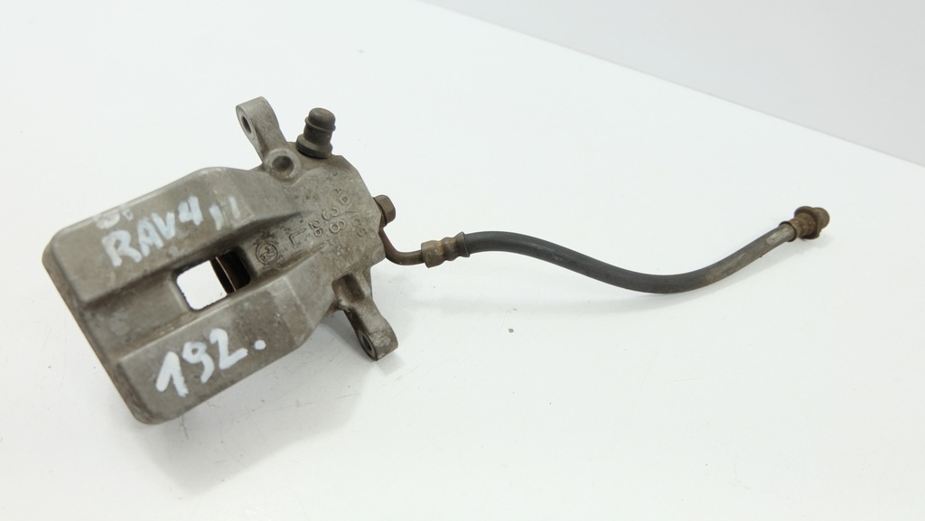 фото №1, Toyota rav4 iii супорт гальмівний лівий задня