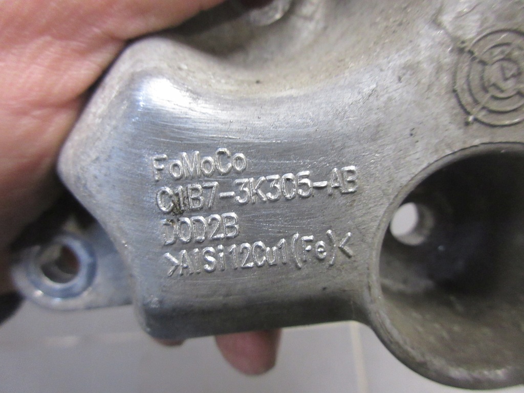 фото №4, Кронштейн опора полуось fiesta mk7 1.0 t ecoboost