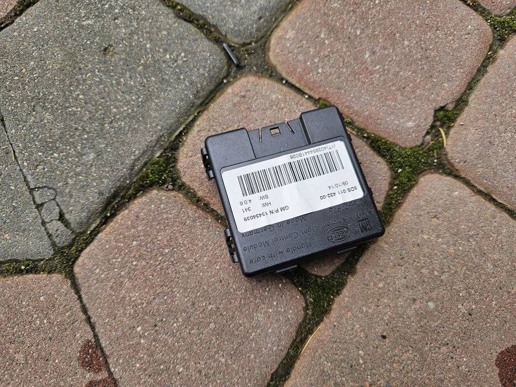 Купити Модуль блок керування світла датчик opel adam 13434039