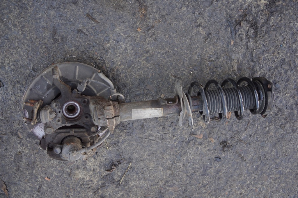 фото №5, Поворотний кулак амортизатор лівий перед skoda superb ii 2.0 tdi