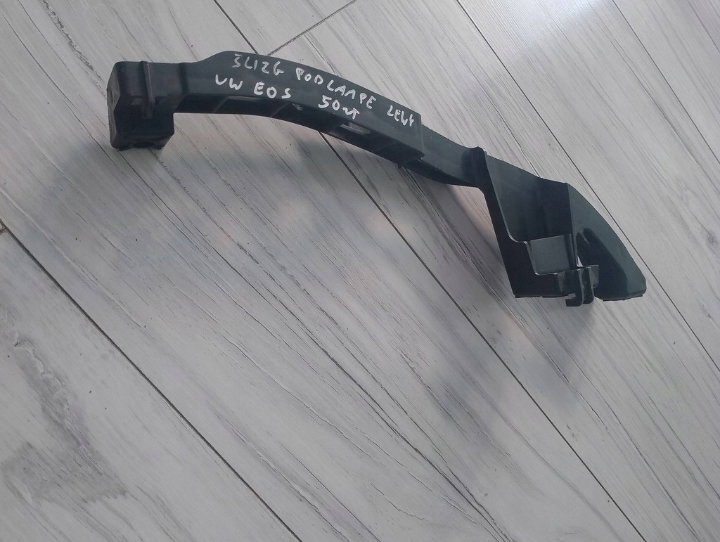 фото №1, Напрямна pod фара лівий vw eos 1q0807889